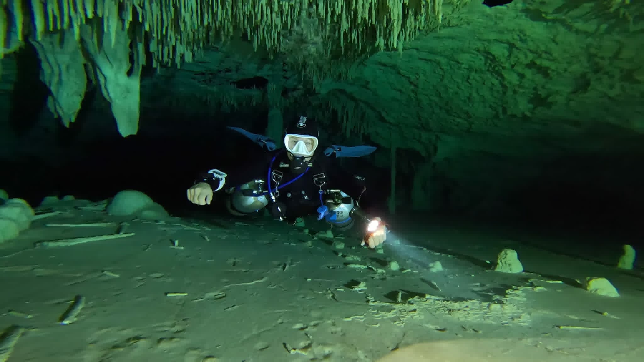 Technical diver in a flooded cave
