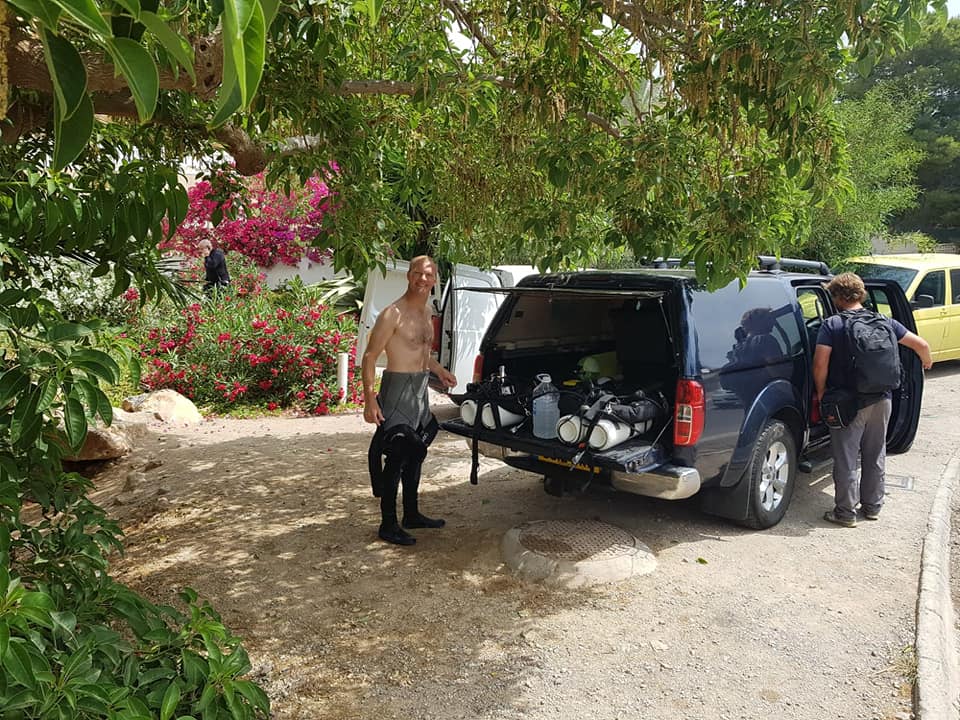 Loading the dive truck with cylinders